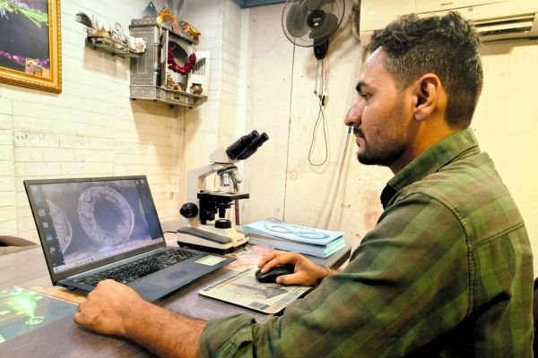 Environmental engineer inspecting water quality